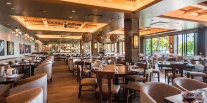 Dining area perfect for coworking at Alohilani Resort Waikiki Beach.