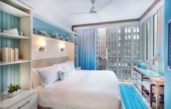 King bed with city views at Margaritaville Resort Times Square.