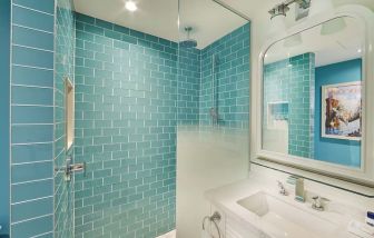 Guest bathroom with shower at Margaritaville Resort Times Square.