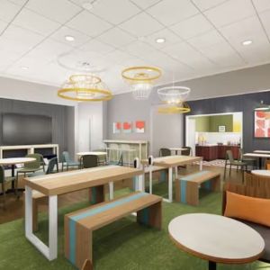 Lounge and coworking space at Spark By Hilton Houston Hobby Airport.