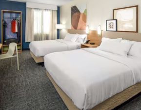 Day room with queen beds at Spark By Hilton Houston Hobby Airport.