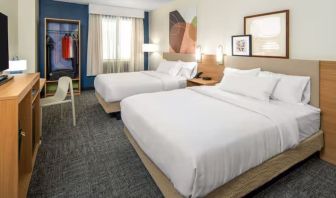 Day room with queen beds at Spark By Hilton Houston Hobby Airport.