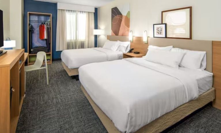 Day room with queen beds at Spark By Hilton Houston Hobby Airport.