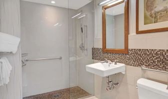 Guest bathroom with shower at Wyndham Garden Chinatown NYC.