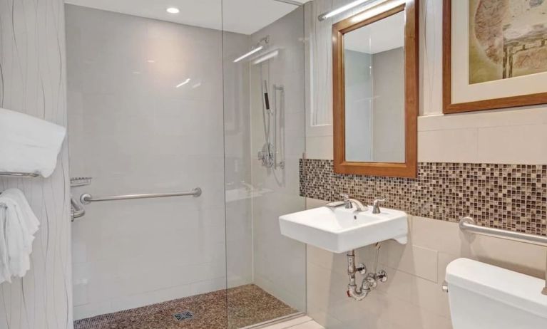 Guest bathroom with shower at Wyndham Garden Chinatown NYC.