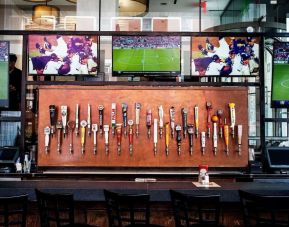 Hotel bar TV at Wyndham Garden Chinatown NYC.