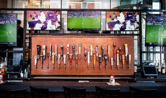 Hotel bar TV at Wyndham Garden Chinatown NYC.