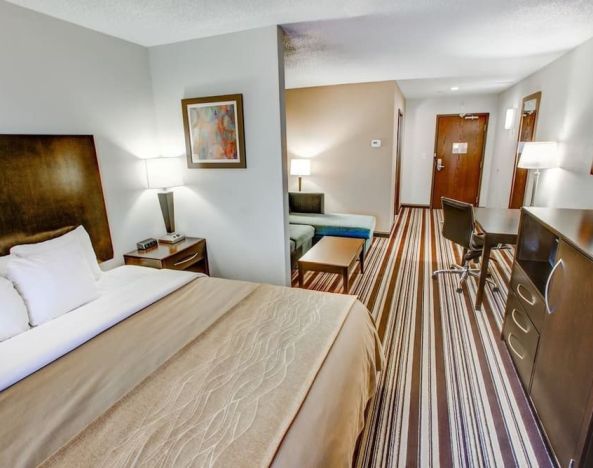 Day use room with living area at Comfort Inn & Suites Triadelphia.