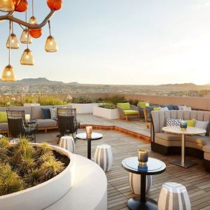 Outdoor furniture in rooftop perfect for coworking at The Plaza Pioneer Park, El Paso.