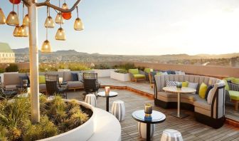 Outdoor furniture in rooftop perfect for coworking at The Plaza Pioneer Park, El Paso.