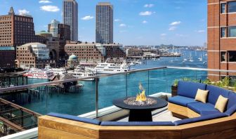 Rooftop furniture with fire pit at The Envoy Hotel, Autograph Collection.