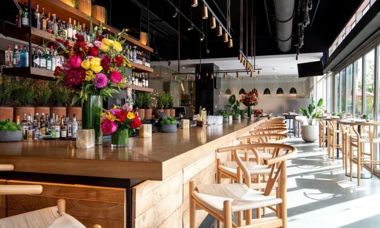 Bar and kitchen at The Envoy Hotel, Autograph Collection.