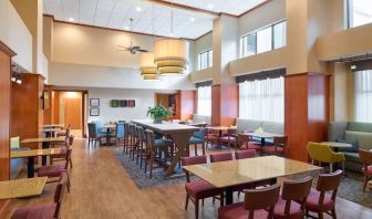 Breakfast area perfect for coworking at Hampton Inn & Suites Providence/Smithfield.