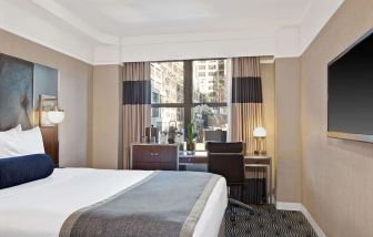 Day use room with work desk at The New Yorker Hotel, A Wyndham Hotel.