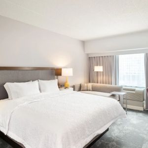 Day use room with work desk and sofa at Hampton Inn Philadelphia Center City - Convention Center.
