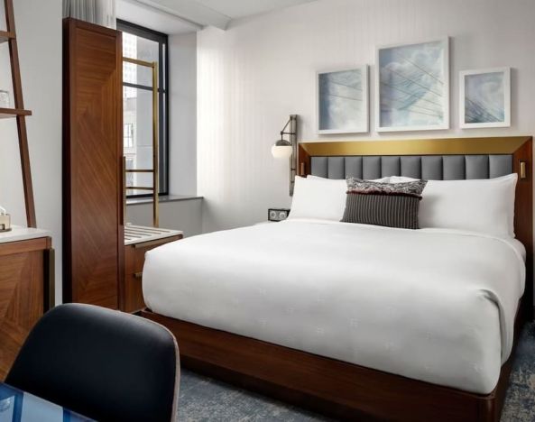 Delux king room with work desk at Rand Tower Hotel, Minneapolis, A Marriott Tribute Portfolio Hotel.