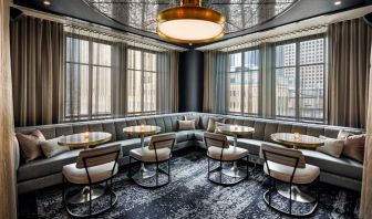 Dining area perfect for coworking at Rand Tower Hotel, Minneapolis, A Marriott Tribute Portfolio Hotel.