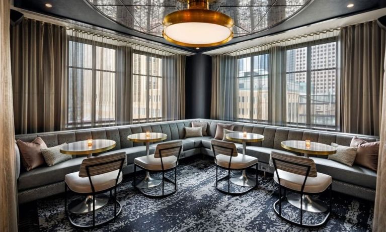 Dining area perfect for coworking at Rand Tower Hotel, Minneapolis, A Marriott Tribute Portfolio Hotel.