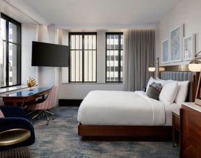 Delux king room with work desk at Rand Tower Hotel, Minneapolis, A Marriott Tribute Portfolio Hotel.