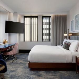 Delux king room with work desk at Rand Tower Hotel, Minneapolis, A Marriott Tribute Portfolio Hotel.