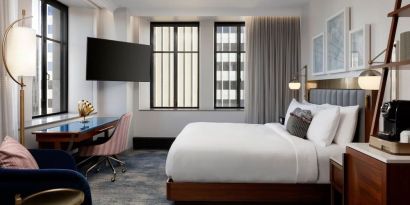 Delux king room with work desk at Rand Tower Hotel, Minneapolis, A Marriott Tribute Portfolio Hotel.