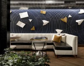 Lobby and coworking lounge at Rand Tower Hotel, Minneapolis, A Marriott Tribute Portfolio Hotel.