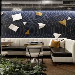 Lobby and coworking lounge at Rand Tower Hotel, Minneapolis, A Marriott Tribute Portfolio Hotel.