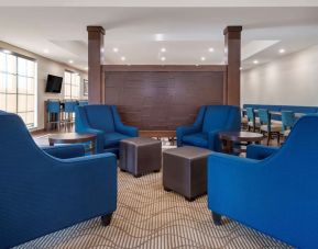 Lobby and coworking lounge at Comfort Inn & Suites Mankato.