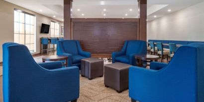 Lobby and coworking lounge at Comfort Inn & Suites Mankato.