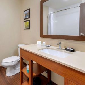 Guest bathroom with shower at Comfort Inn & Suites Mankato.