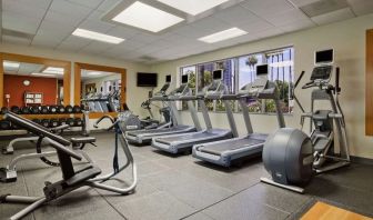 Fully equipped fitness center at Embassy Suites By Hilton San Diego-La Jolla.