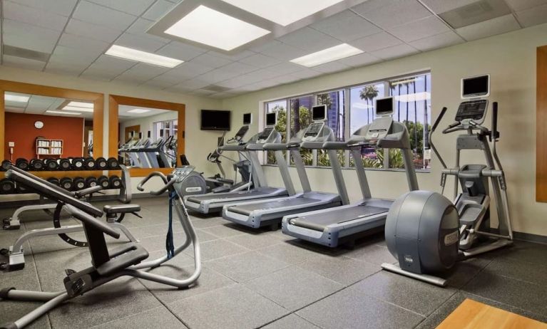 Fully equipped fitness center at Embassy Suites By Hilton San Diego-La Jolla.