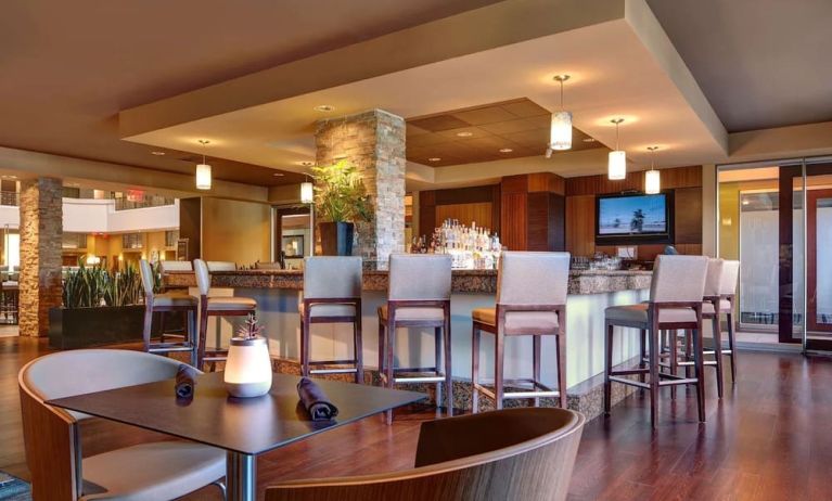 Hotel bar with lounge seating at Embassy Suites By Hilton San Diego-La Jolla.