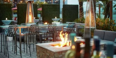 Outdoor patio at Embassy Suites By Hilton San Diego-La Jolla.