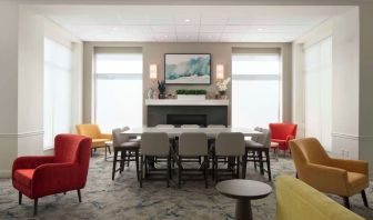 Lobby lounge with comfortable seating and workspace at Hilton Garden Inn Kennett Square.