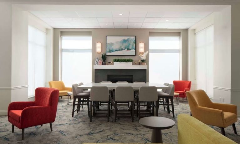 Lobby lounge with comfortable seating and workspace at Hilton Garden Inn Kennett Square.