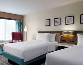 Day use twin room with lounge seating at Hilton Garden Inn Kennett Square.