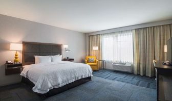 Spacious day use room with king bed at Hampton Inn Chicago North/Loyola Station.