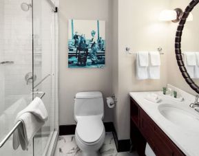 Guest bathroom with shower at Hilton Brooklyn New York.