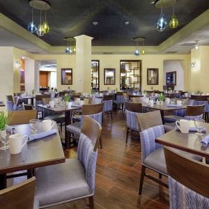 Breakfast area perfect for coworking at DoubleTree By Hilton Orlando Downtown.
