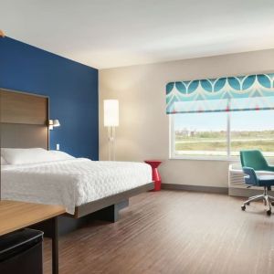 Spacious day use room with work desk at Tru By Hilton Milwaukee Brookfield.