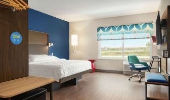 Spacious day use room with work desk at Tru By Hilton Milwaukee Brookfield.