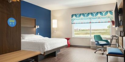 Spacious day use room with work desk at Tru By Hilton Milwaukee Brookfield.