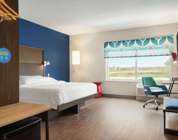 Spacious day use room with work desk at Tru By Hilton Milwaukee Brookfield.