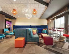 Lobby and coworking lounge at Tru By Hilton Milwaukee Brookfield.