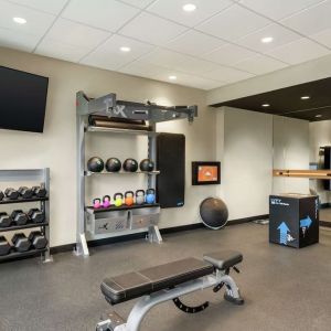 Fitness center at Tru By Hilton Milwaukee Brookfield.