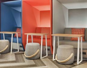 Comfortable and sound-proof workspace cubicles at Tru By Hilton Milwaukee Brookfield.