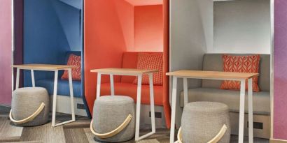 Comfortable and sound-proof workspace cubicles at Tru By Hilton Milwaukee Brookfield.