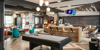 Billiards table available in the lobby of Tru By Hilton Milwaukee Brookfield.