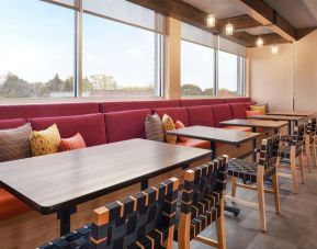 Dining area perfect for coworking at Tru By Hilton Milwaukee Brookfield.